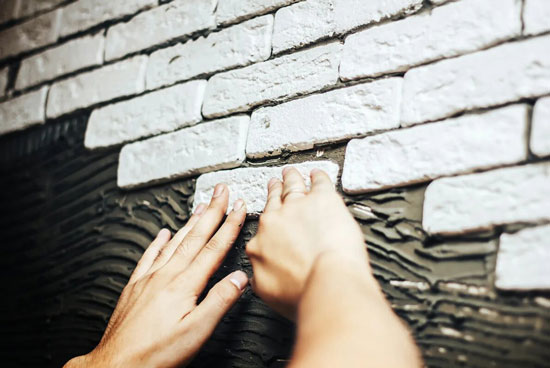 installing tile with adhesive